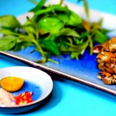 Hình ảnh Ốc Cà Na Xào Rau Muống