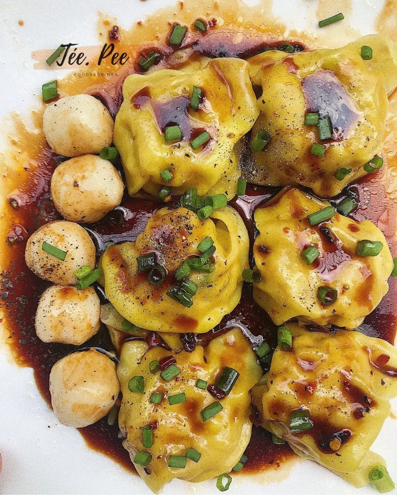 Hình ảnh Hoành thánh cá viên sốt dầu hào-蚝油鱼丸馄饨