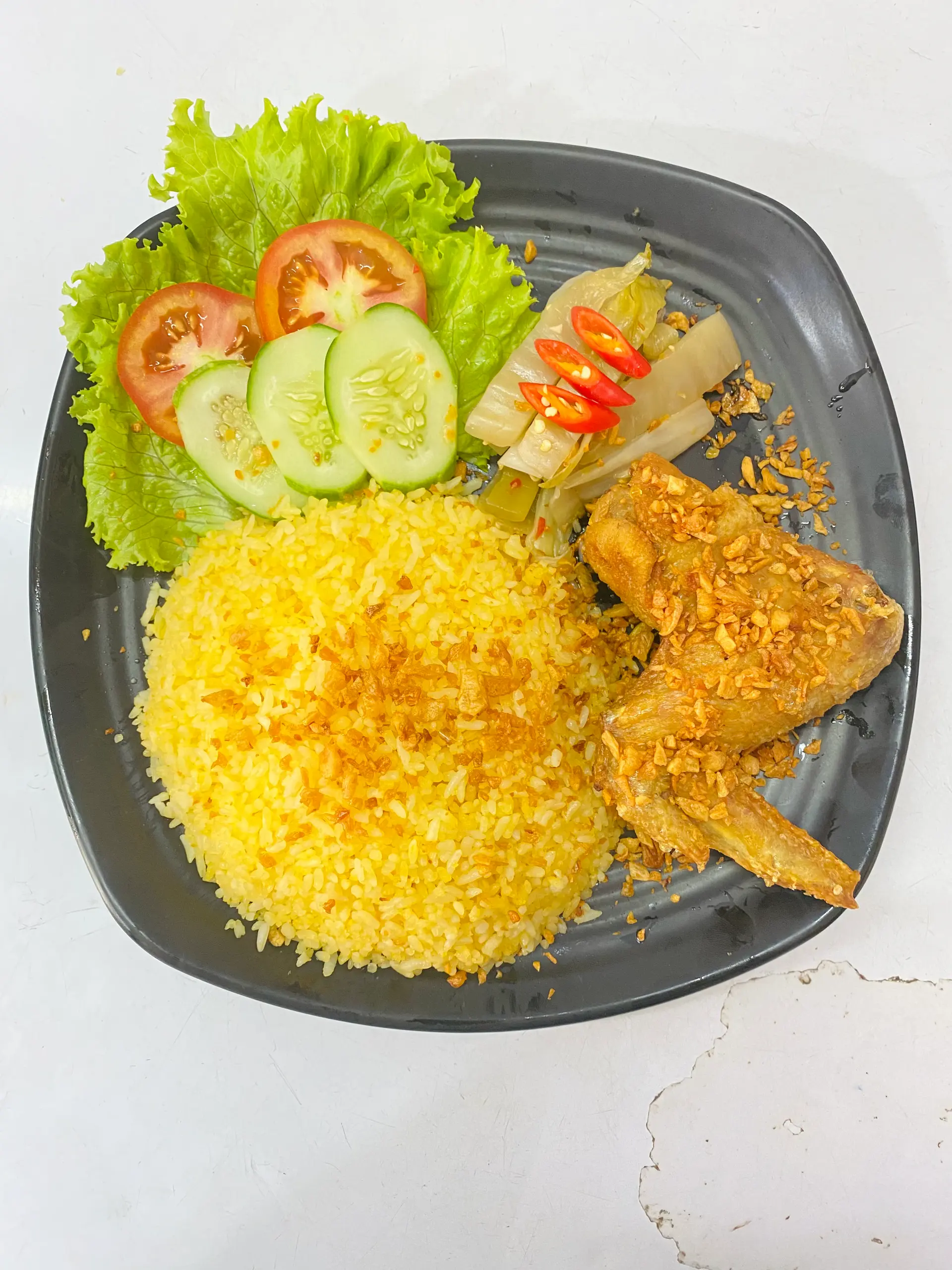 Hình ảnh Cơm cánh gà sốt mắm tỏi