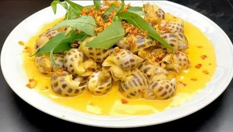 Hình ảnh Ốc Hương Xào Bơ Tỏi