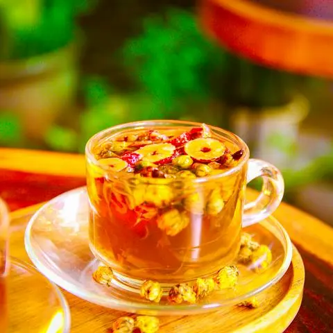 Hình ảnh Trà Cúc Nụ mix Hồng Tây Tạng (Trà thảo mộc nóng -Không đá)
