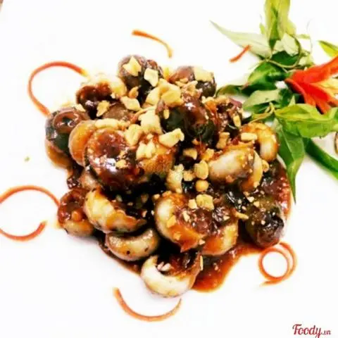Hình ảnh Ốc mỡ xào me
