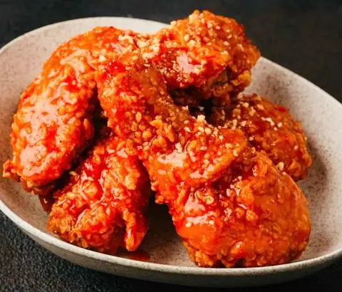 Hình ảnh Đùi gà rán sốt cay-1 đùi tỏi