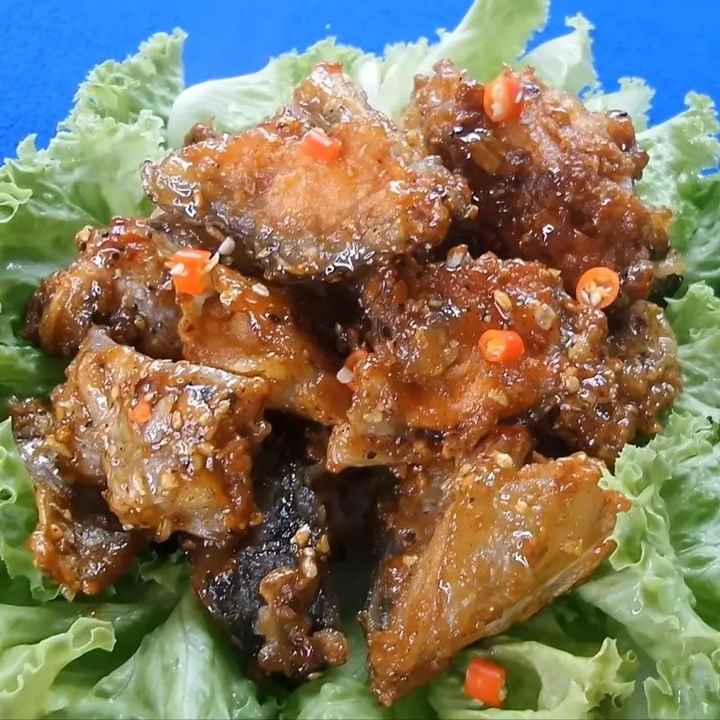 Hình ảnh ĐẦU CÁ HỒI CHIÊN MẮM