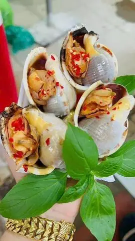 Hình ảnh Ốc tỏi nướng muối ớt một con