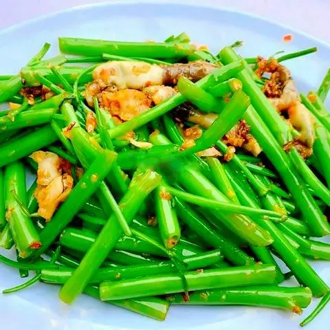 Hình ảnh Ốc móng tay xào rau muống
