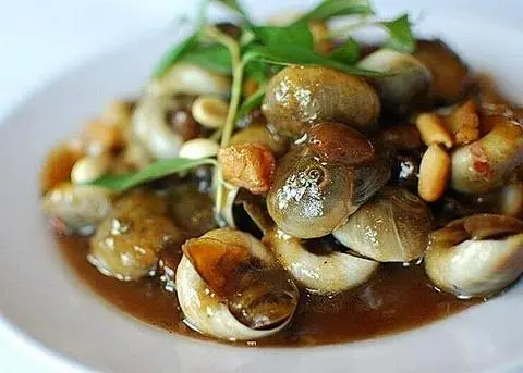 Hình ảnh ốc mỡ xào me 