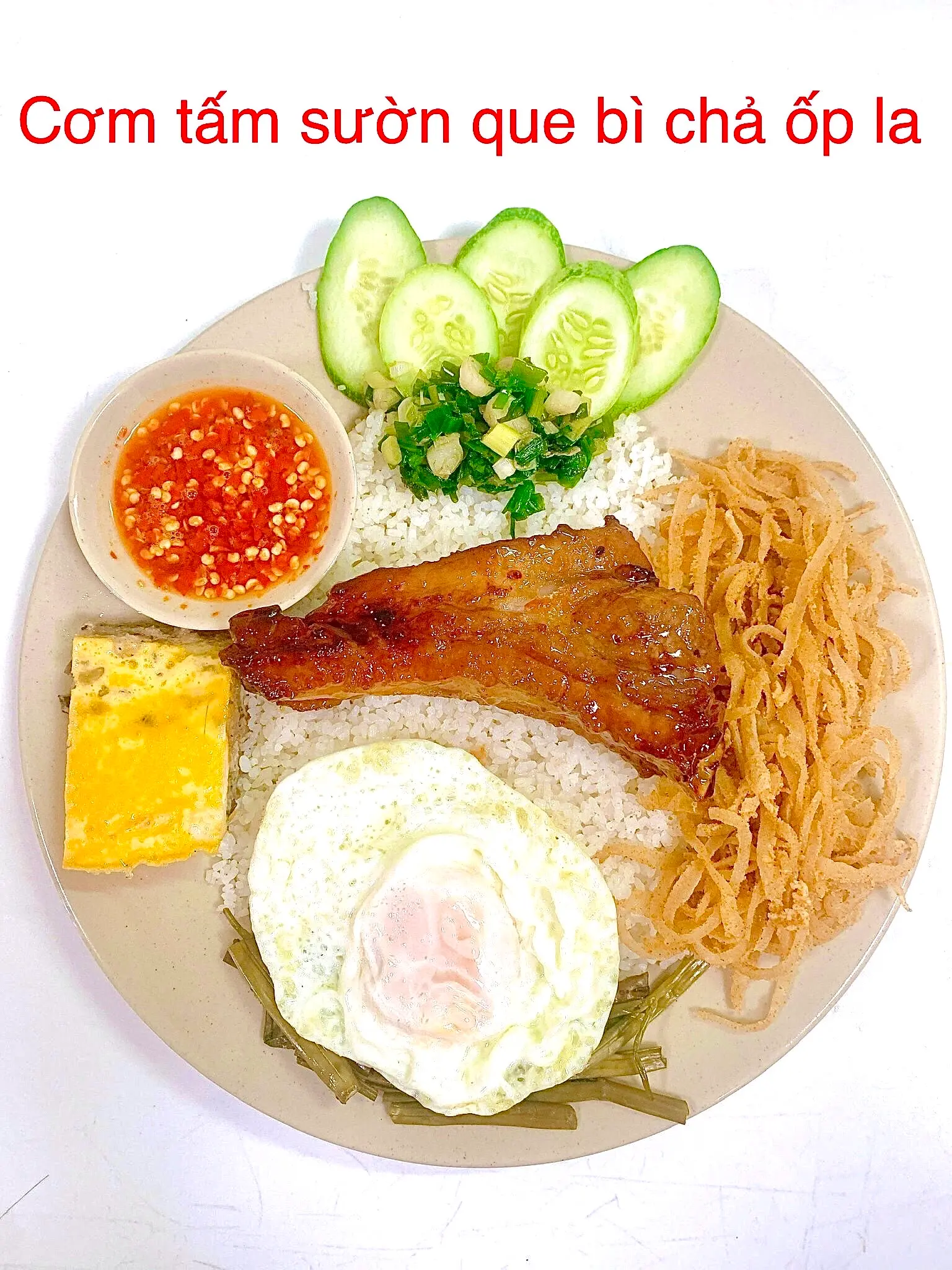 Hình ảnh Cơm Tấm Sườn Que Bì Chả Ốp La