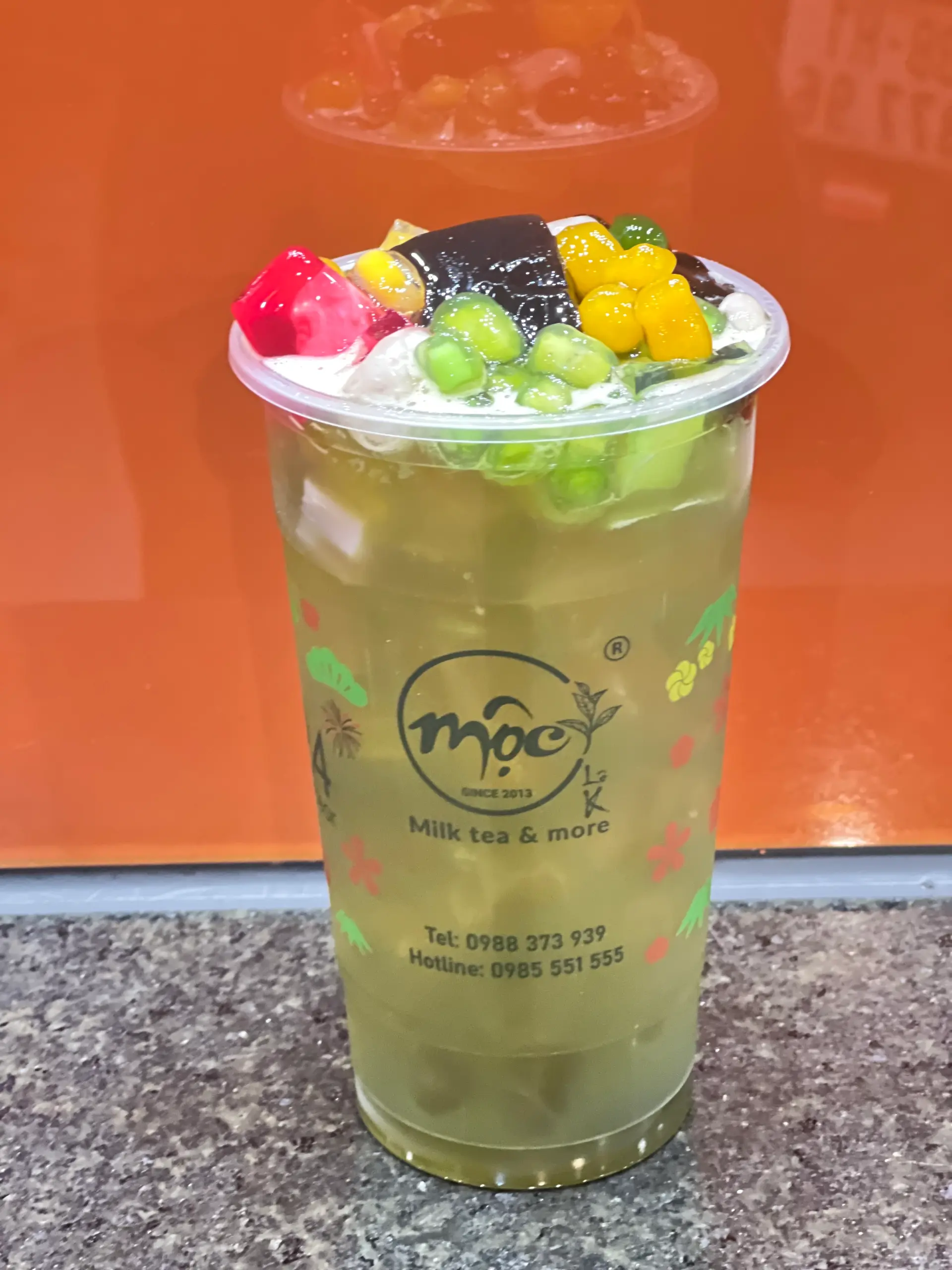 Hình ảnh Hồng trà dưa lưới full toppings