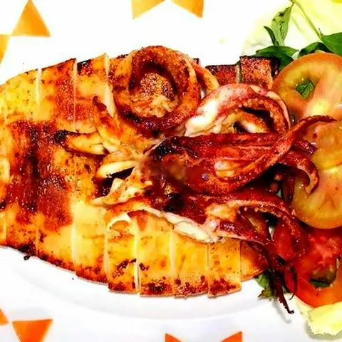 Hình ảnh Mực Nướng Muối Tiêu Xanh