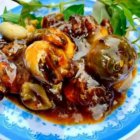 Hình ảnh Ốc mỡ xào me