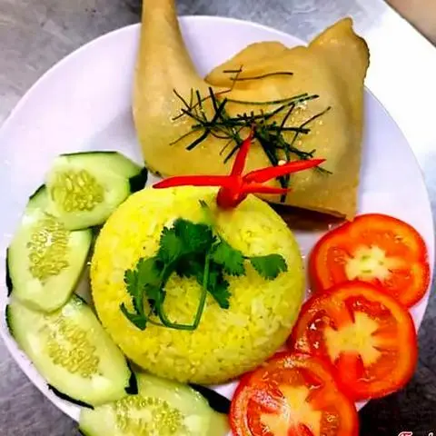 Hình ảnh Cơm gà góc tư đùi lớn