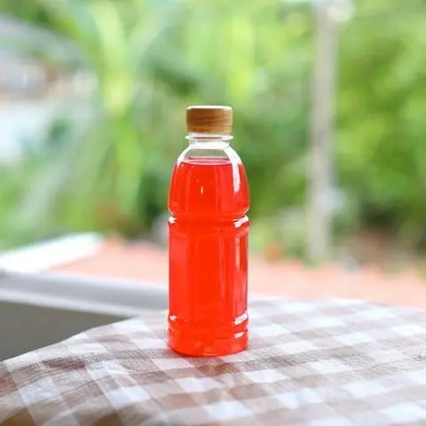 Hình ảnh Trà Chanh Thái Đỏ Chai 250ml + Ly Đá