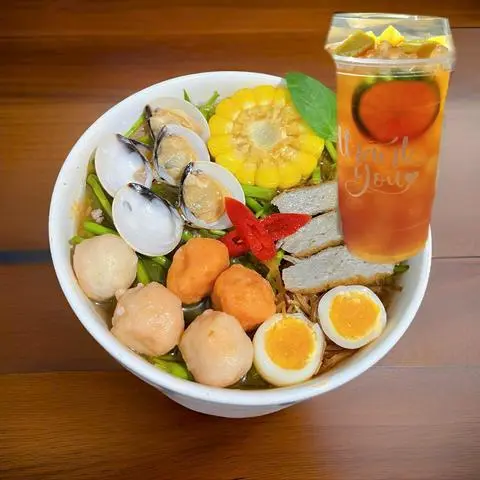 Hình ảnh combo 1 bún thái chả cá cá viên  + 1 trà tắc cam xoài
