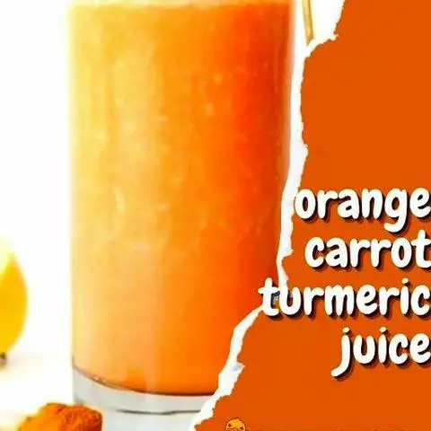 Hình ảnh Nước ép cam - cà rốt - bột nghệ - 700ml