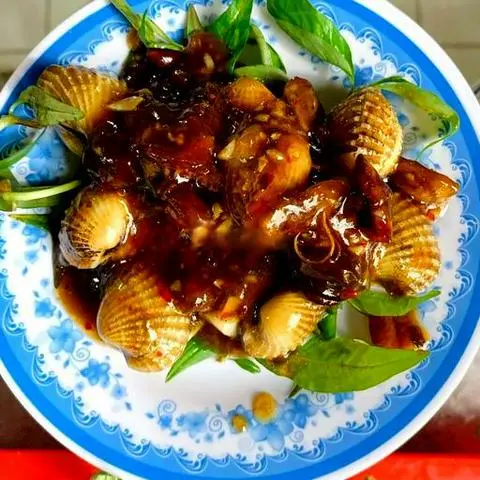 Hình ảnh Sò huyết xào me