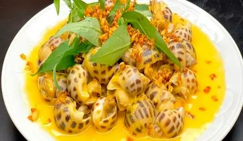 Hình ảnh Ốc hương xào bơ tỏi 