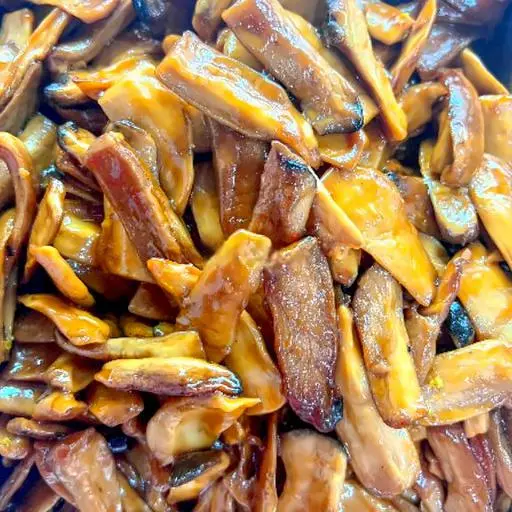 Hình ảnh Cơm nấm đùi gà sốt dầu hào