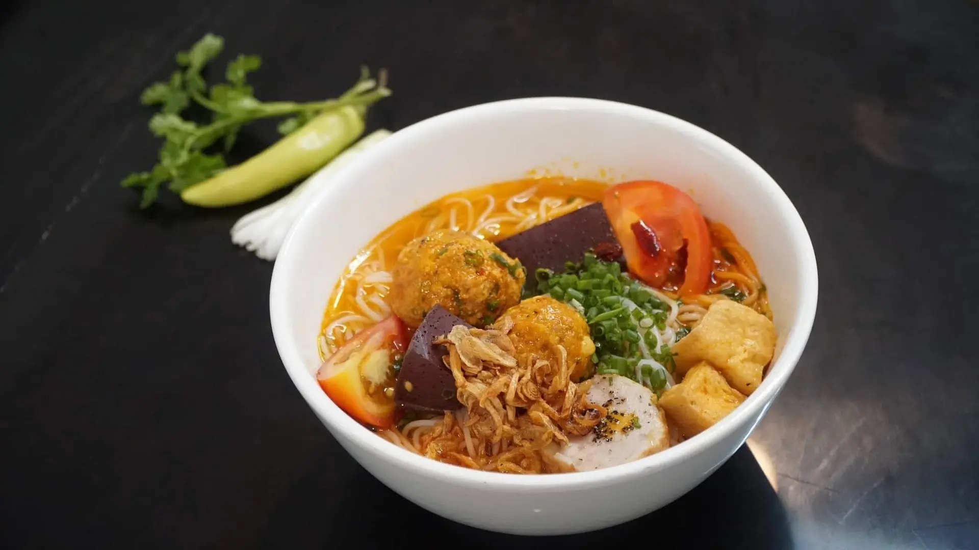 Hình ảnh Bún riêu ốc (có bò tái)