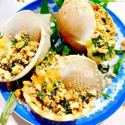 Hình ảnh Ốc tỏi nướng mỡ hành 1 con