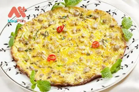 Hình ảnh Cơm niêu trứng chiên thịt + 1 nước tự chọn