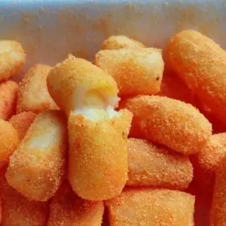 Hình ảnh Tokbokki nhân phô mai lắc phô mai
