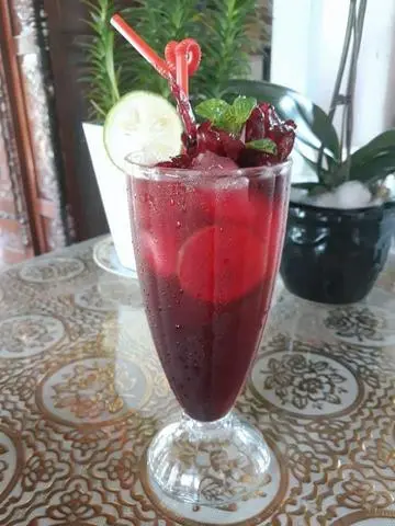 Hình ảnh Nước hoa atiso đỏ