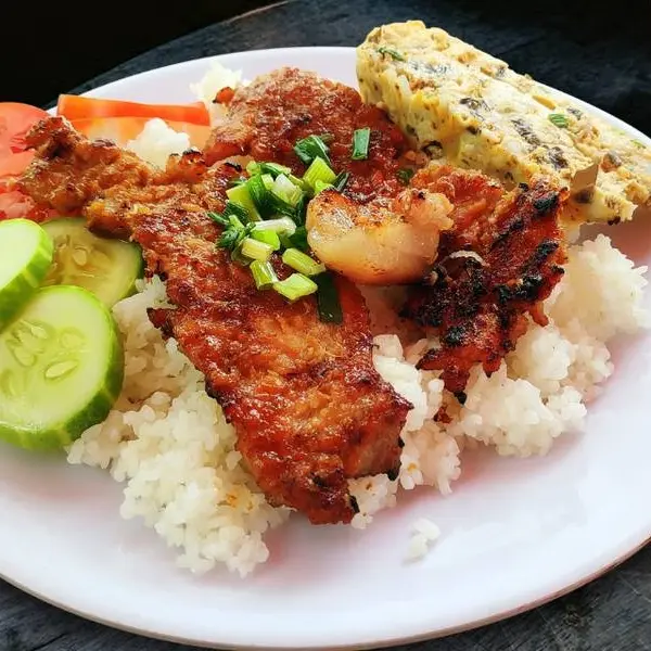 Hình ảnh Cơm Sườn nướng+Trứng Hấp(Tặng ly trà tắc ) 