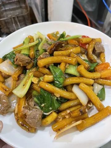 Hình ảnh Nui xào bò cải chua