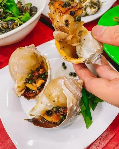 Hình ảnh Ốc tỏi nướng phô mai một con