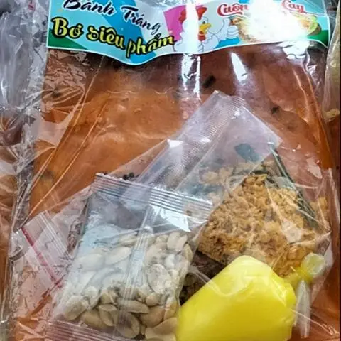Hình ảnh BÁNH TRÁNG BƠ CUỘN GÀ CAY 