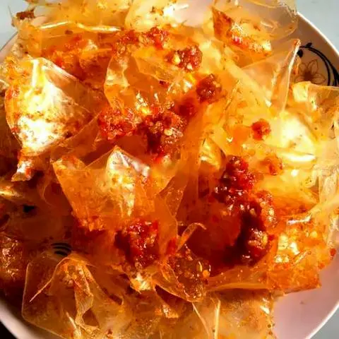 Hình ảnh 100gr Bánh tráng phơi sương sate tỏi