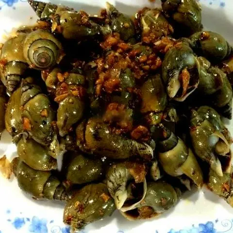 Hình ảnh Ốc cà na xào me
