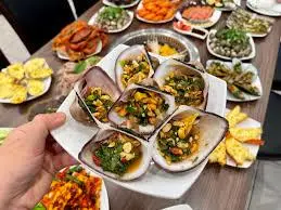 Hình ảnh Sò sữa nướng mỡ hành
