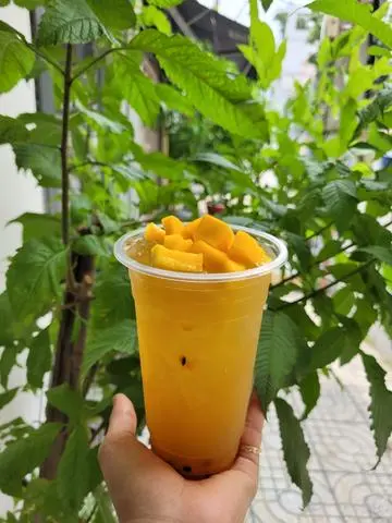 Hình ảnh Trà xoài chanh dây 700ml 