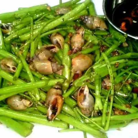Hình ảnh Ốc gạo xào rau muống