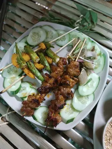 Hình ảnh 1 xiên thịt ba rọi rút xương nướng