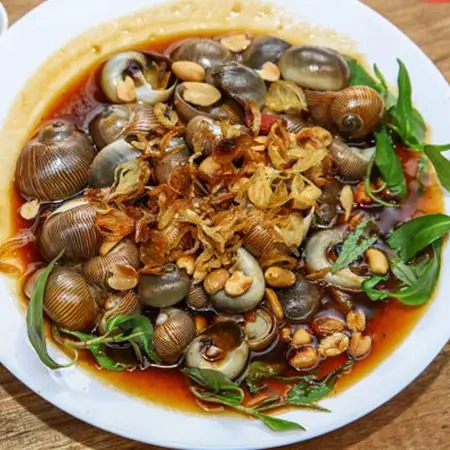 Hình ảnh Ốc mỡ xào sate