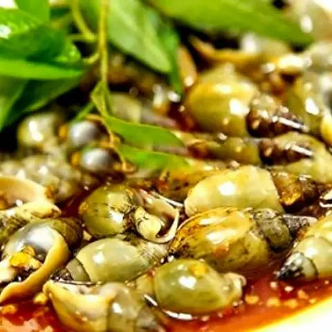 Hình ảnh Ốc cà na xào bơ tỏi