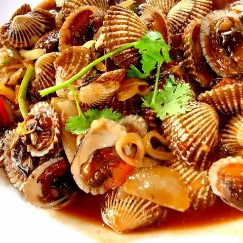 Hình ảnh Sò huyết xào me
