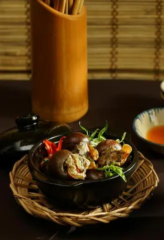 Hình ảnh Ốc Nhồi Thịt Hấp Lá Gừng