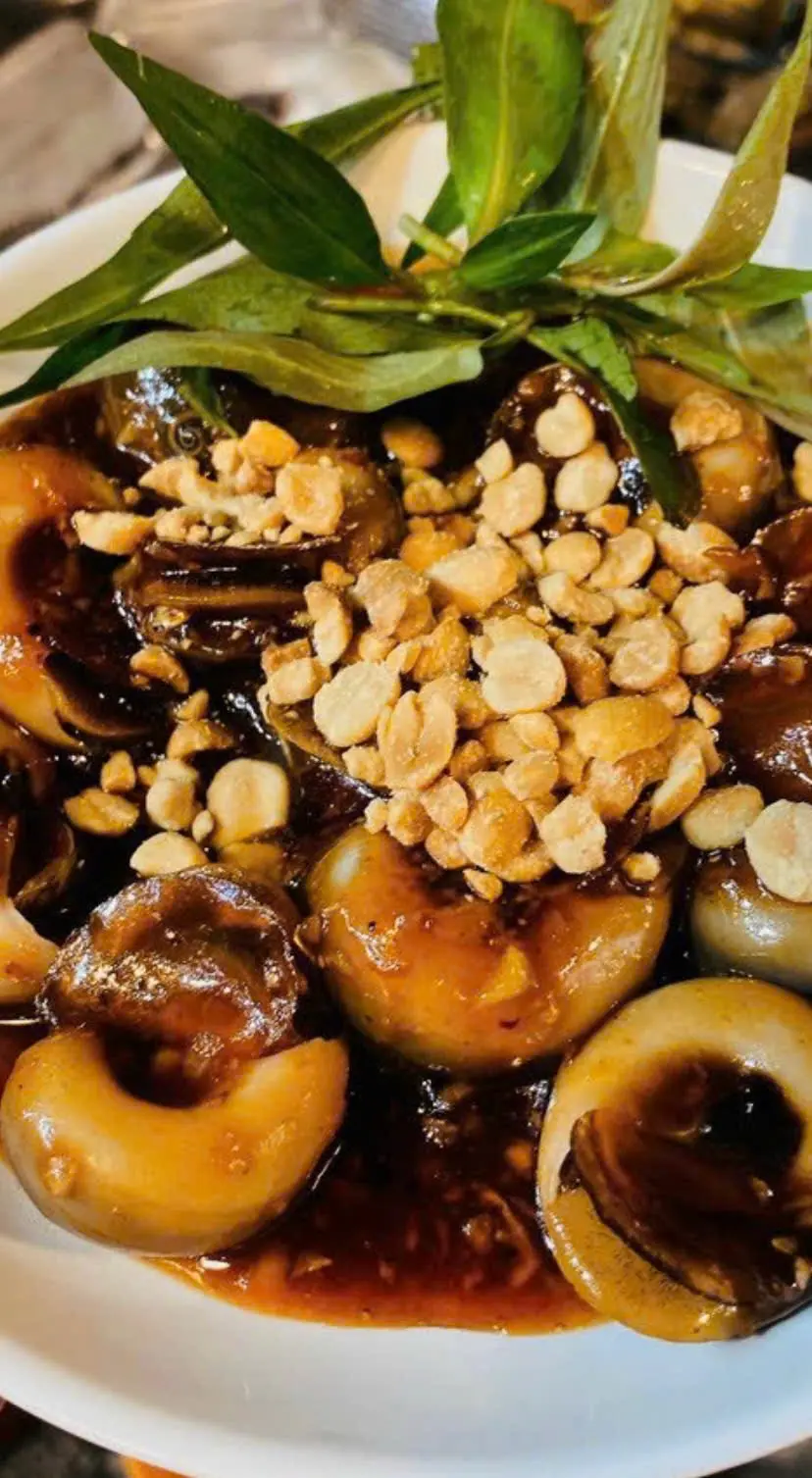 Hình ảnh Ốc mỡ xào me