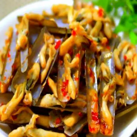 Hình ảnh Ốc móng tay cháy tỏi