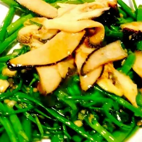 Hình ảnh Ốc giác xào rau muống