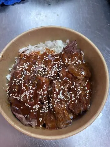 Hình ảnh CƠM BÒ BÍT TẾT NƯỚNG
