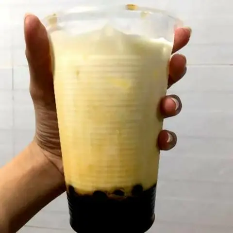 Hình ảnh Sữa tươi trân châu đường đen khúc bạch