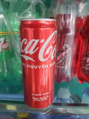 Hình ảnh Coca Lon + 1 Ly Đá 