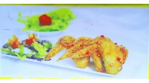 Hình ảnh Cơm cánh gà chiên bơ