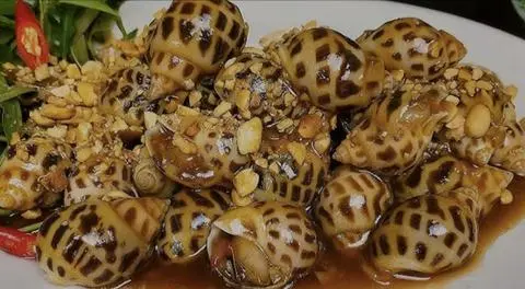 Hình ảnh Ốc hương xào me 