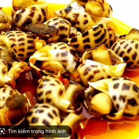 Hình ảnh Ốc hương xào bơ cay